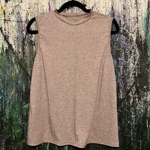 Cowl neck sleeveless top.